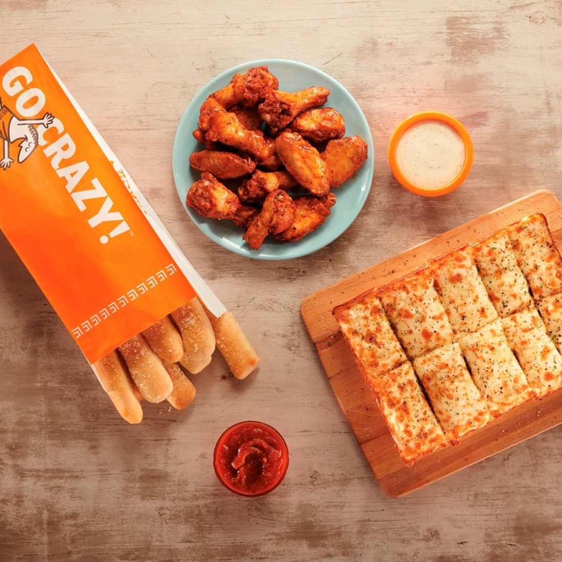 Equipo y producto Little Caesars
